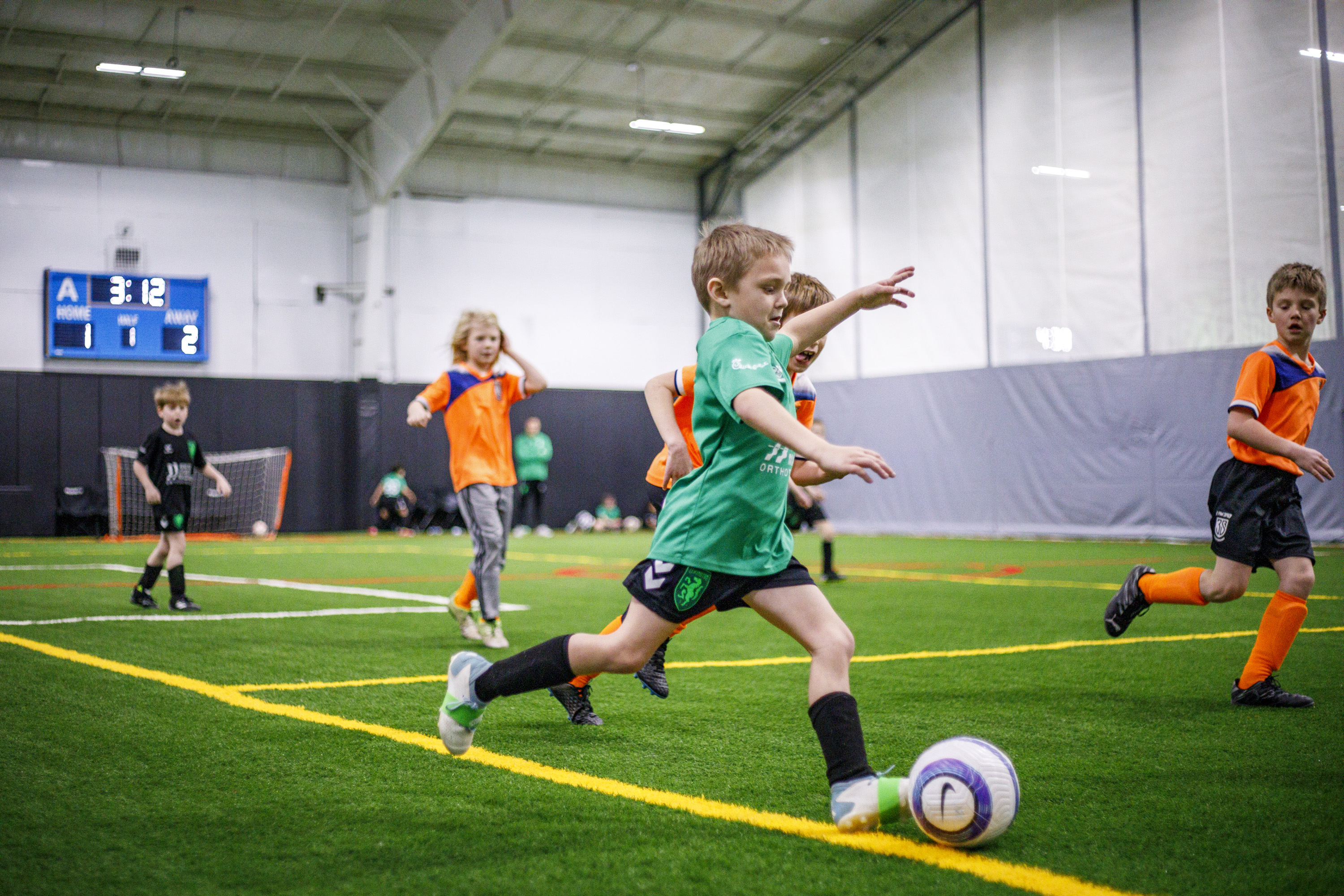 A young player on the field at LSC Indoor