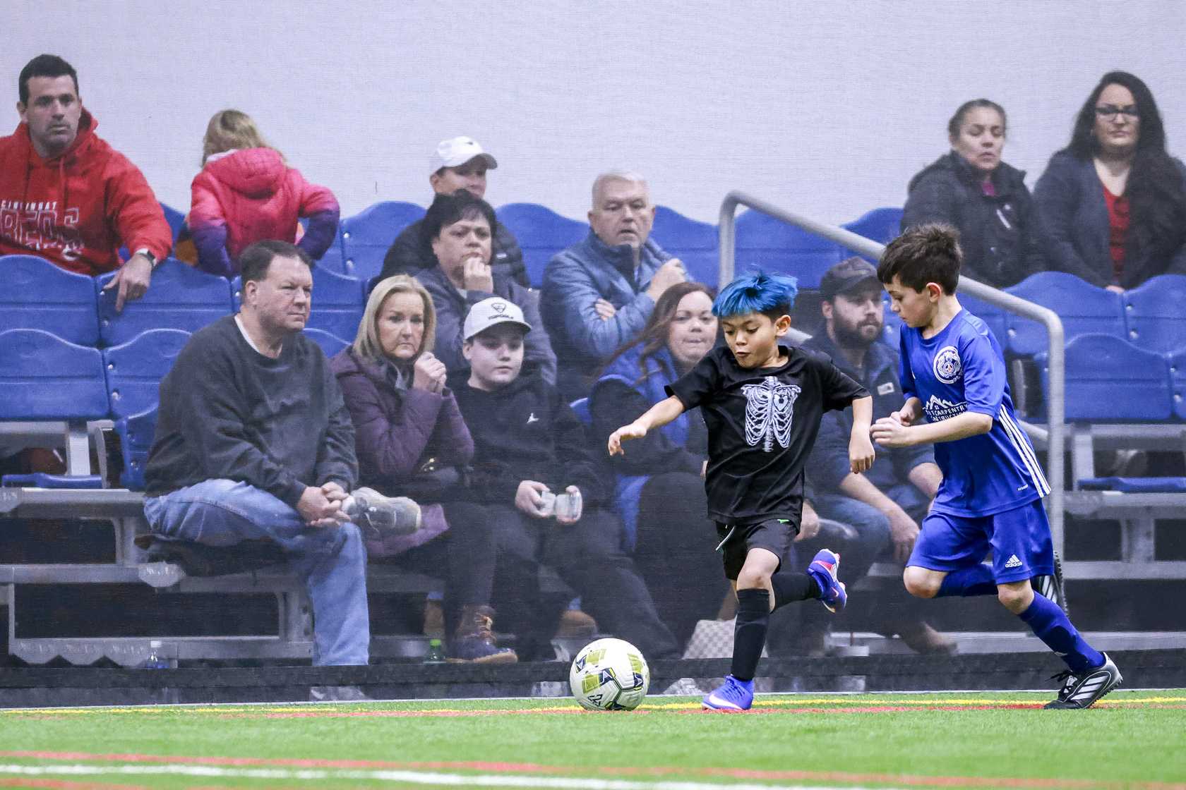 Youth players on the turf at LSC Indoor