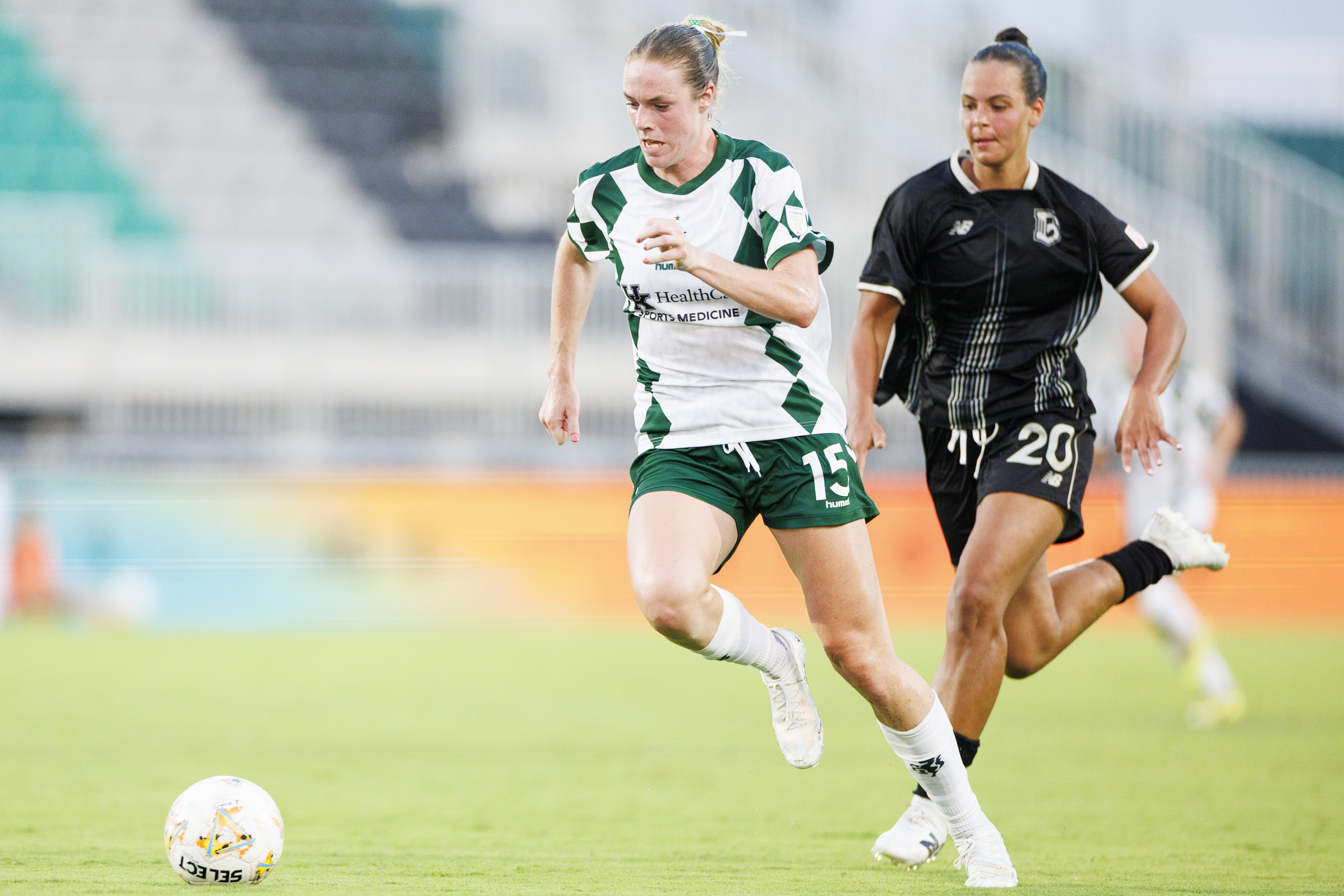 LSC player attacking against a defender
